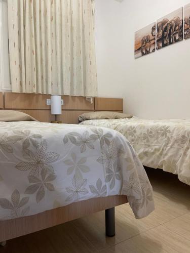 Posteľ alebo postele v izbe v ubytovaní APARTAMENTO ZONA MARINADOR, CERCA A LA PLAYA