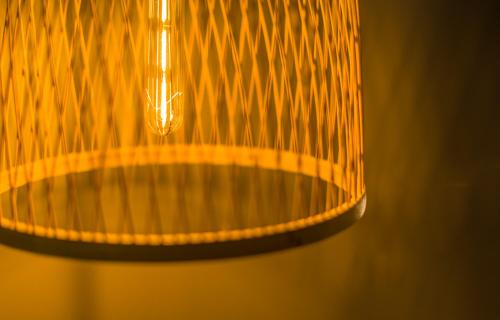 a close up of a chandelier in a room at La Bastide de Caro in Siem Reap