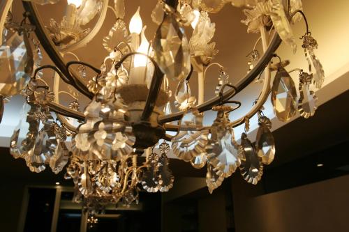 a chandelier hanging from a ceiling in a room at 248 Finisterra in Buenos Aires
