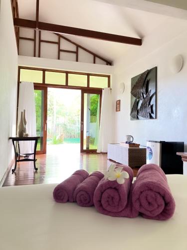 a room with a pile of towels on the floor at Villa Formosa Panglao in Panglao