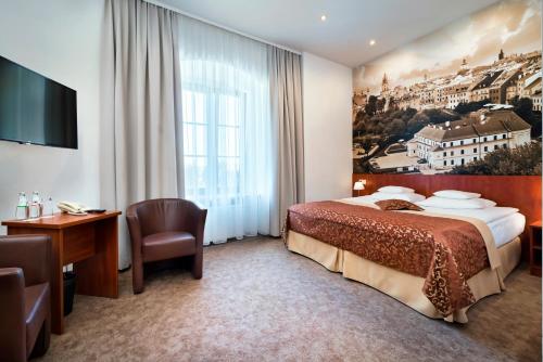 Кровать или кровати в номере Dom na Podwalu