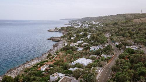 an aerial view of a town next to the water at Salento incantevole alloggio fronte mare in Marittima