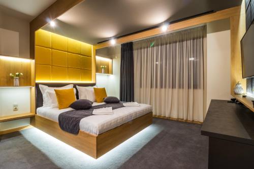 Katil atau katil-katil dalam bilik di EMAR HOTEL & SPA