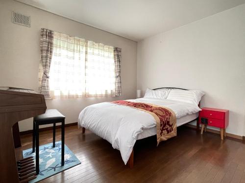 En eller flere senger på et rom på 京樽2号 1棟貸切 一軒家 4-Bedrooms Duplex Private Villa KYOTARU2