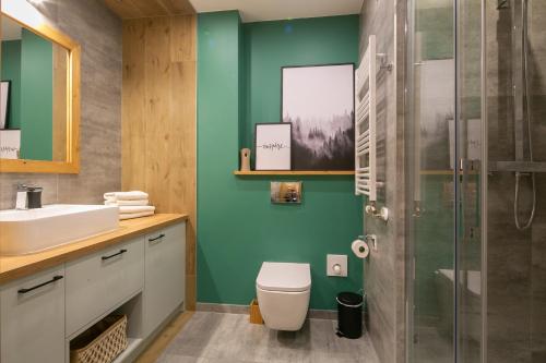 Kúpeľňa v ubytovaní Apartament Forest Centrum