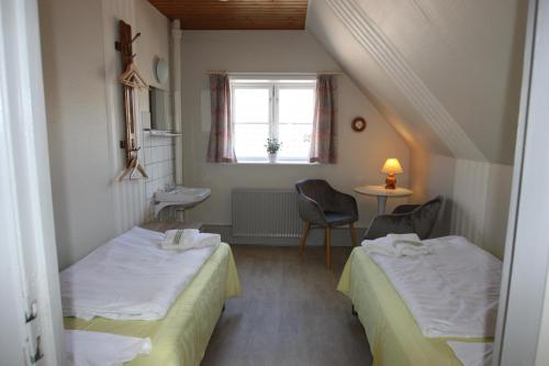 Voodi või voodid majutusasutuse Hostel Rudbøl toas
