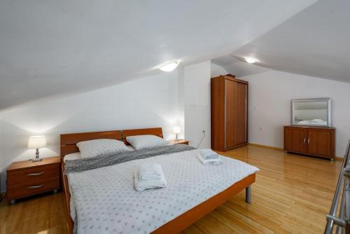 Postel nebo postele na pokoji v ubytování Adria Apartments