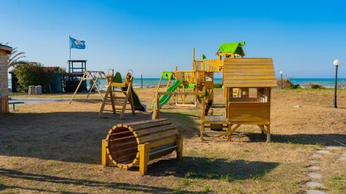 a park with a playground with a play equipment at Centro Turistico San Nicola in Peschici