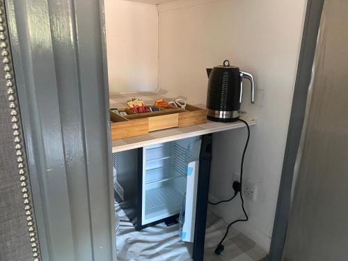 Kuchyň nebo kuchyňský kout v ubytování Wellbrook Rooms