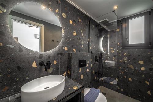 Kúpeľňa v ubytovaní Nemesis Luxury Villas