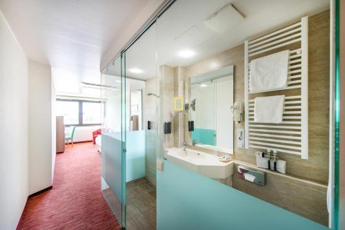 Koupelna v ubytování Diehls Hotel