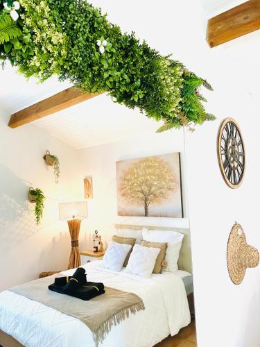 Postel nebo postele na pokoji v ubytování Villa Cosy & Confort dans un Écrin de Verdure