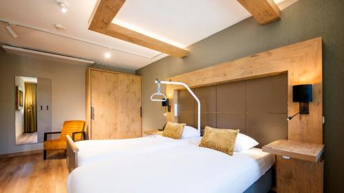 Posteľ alebo postele v izbe v ubytovaní De Egmonden