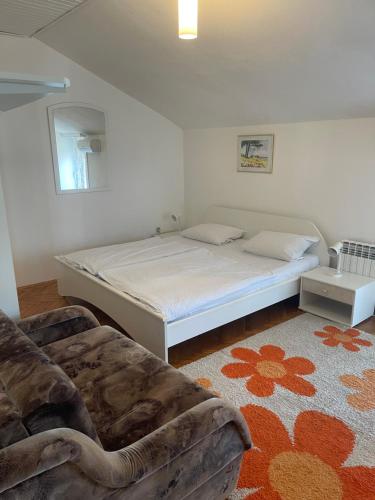 Postel nebo postele na pokoji v ubytování Villa Jadro