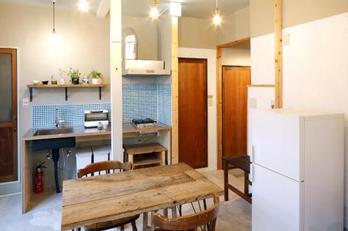 A kitchen or kitchenette at Tokyo Hikari Guesthouse