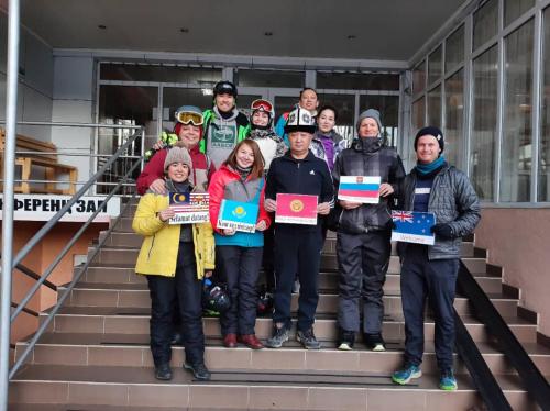 a group of people standing on stairs holding certificates at Tagaytay Karakol Hotel in Karakol