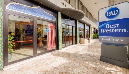 a store with a best western sign in a mall at Best Western Hotel Tritone in Mestre