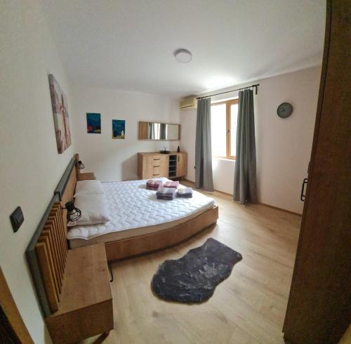 Postel nebo postele na pokoji v ubytování Port Natura Apartment