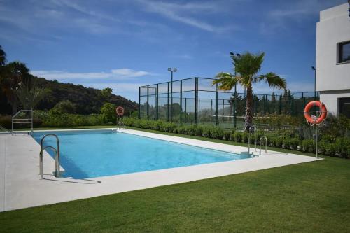 Bazén v ubytovaní Appartement Casares - Mer, Golf, Piscine, Padel - FINCA CORTESIN alebo v jeho blízkosti