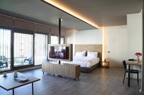 Un pat sau paturi într-o cameră la Apartman Istanbul