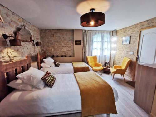 Ένα ή περισσότερα κρεβάτια σε δωμάτιο στο Residence La Borde