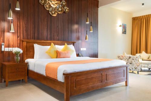 Postel nebo postele na pokoji v ubytování Birds Resort Hambantota