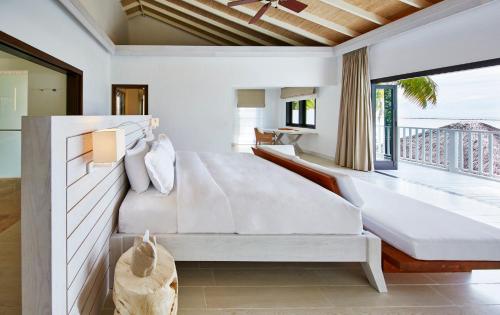 Cama o camas de una habitación en COMO Maalifushi