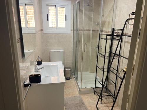 Ванная комната в Casa Julita con Parking