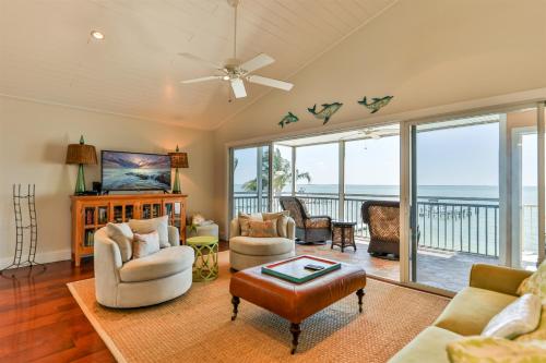 a living room with a view of the ocean at Captiva Hide A Way 2B in Captiva