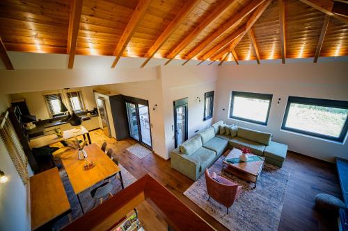 an overhead view of a living room with a couch and a table at Villa de Vino in Ioannina
