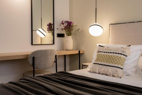Letto o letti in una camera di ALFA LUXURY APARTMENTS