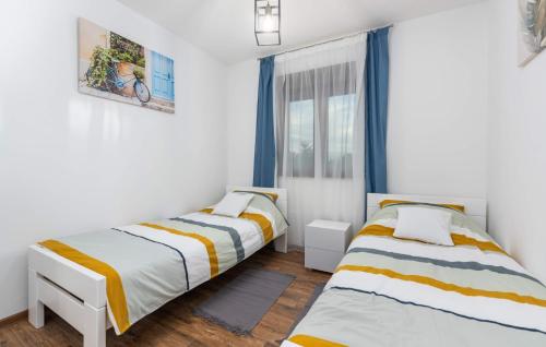 Postel nebo postele na pokoji v ubytování Villa Bibali