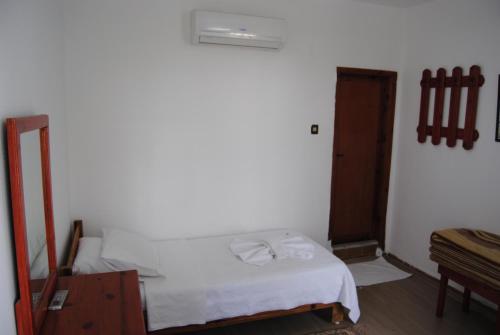 Ένα ή περισσότερα κρεβάτια σε δωμάτιο στο Hotel Hisarlık