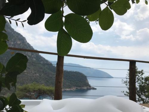 a view of the ocean from a mountain at Kabak Ütopya Kamp in Faralya