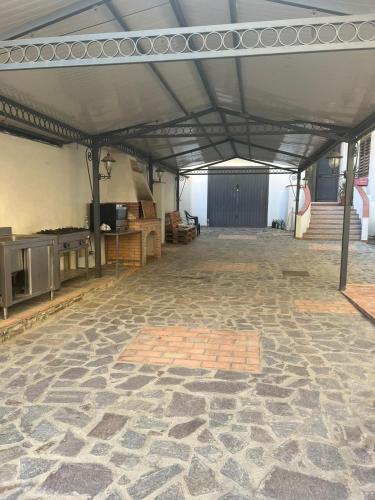 a large tent with a stone floor in a room at Casa Vacanza Riviera dei Saraceni in Trebisacce