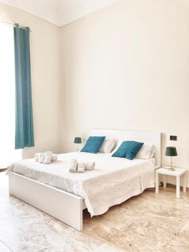 Letto o letti in una camera di Casa Museo Stephanus