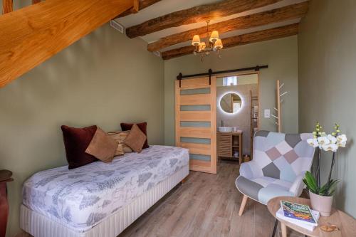 Postel nebo postele na pokoji v ubytování Gîte de la Besnardière