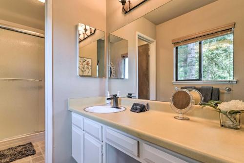 a bathroom with a sink and a mirror at Alpine Meadows Condo with Mtn Views Near Lake Tahoe in Alpine Meadows