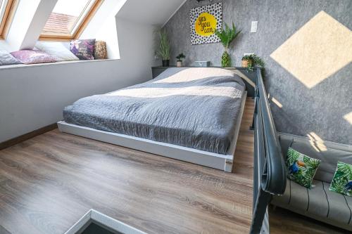 Letto o letti in una camera di Palms Apartments Budapest