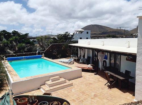 Piscina a Islabella Lanzarote habitaciones en Villa con entrada particular o a prop