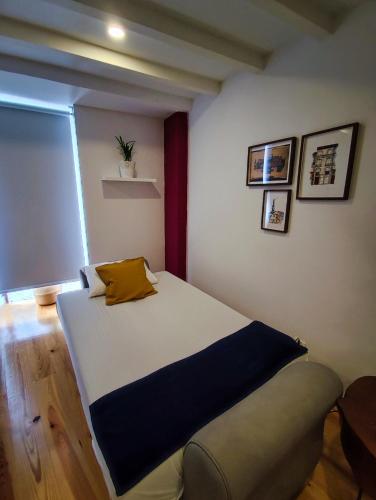 a bedroom with a bed in a room at WLoft in Vila Nova de Gaia