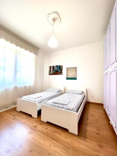 Ένα ή περισσότερα κρεβάτια σε δωμάτιο στο Nanda house