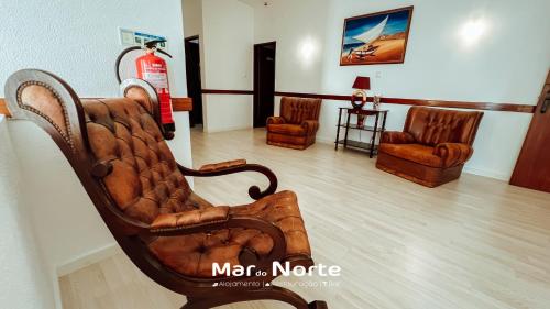 a room with a fire extinguisheracistacistacist at Beach Residence Mar do Norte in Ribamar