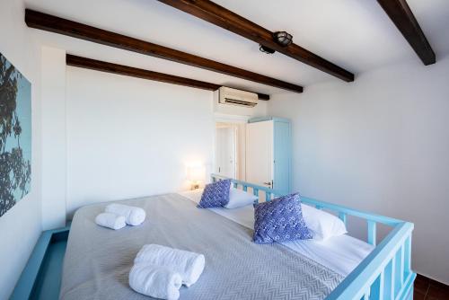 Кровать или кровати в номере Villa Salamina