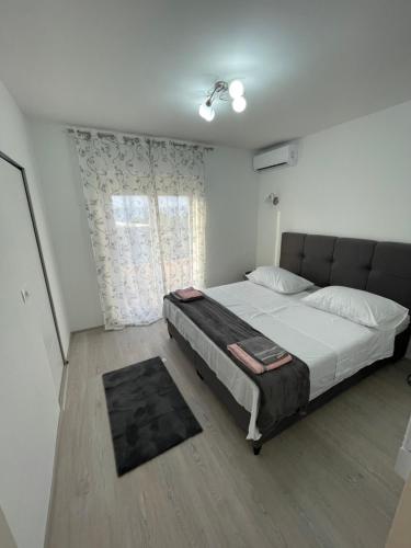 Postel nebo postele na pokoji v ubytování Ivo&Lenda2