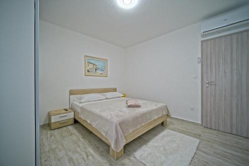 Ένα ή περισσότερα κρεβάτια σε δωμάτιο στο Luxury apartment "Blue Diamond"