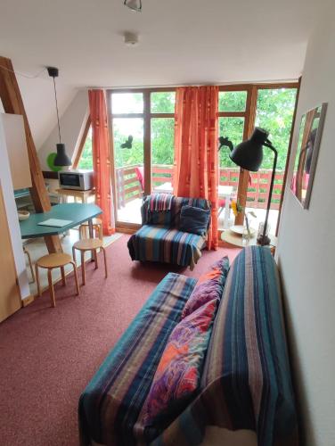 Posezení v ubytování Five Oaks - Grüne Wohnung