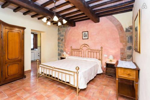 מיטה או מיטות בחדר ב-Principe Del Trasimeno