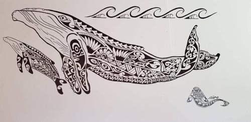 an illustration of a whale with a tribal ornament at Location " la Pirogue " Maison d'Hôtes à Moorea in Haapiti