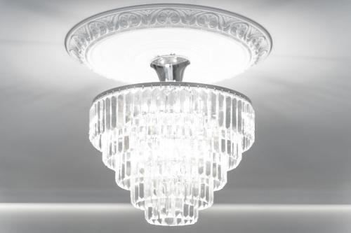 a silver chandelier hanging from a ceiling at Silver Apartments in Świnoujście